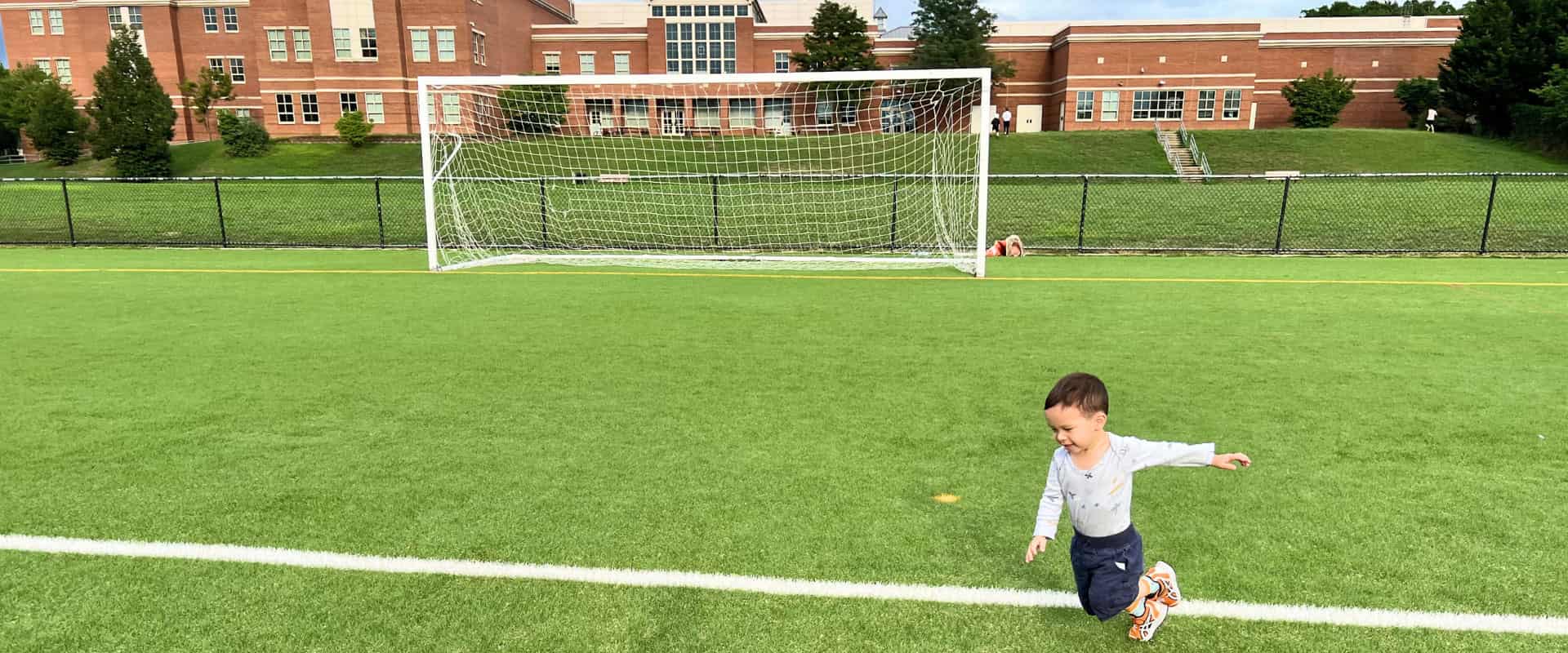 young boy on a soccer field